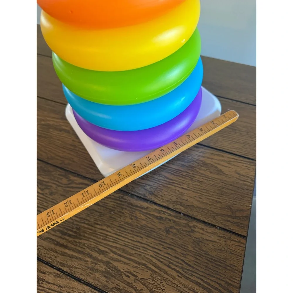 Fisher-Price Rock-a-Stack Rainbow Ring Stacker Baby Toy with Rattle Beads